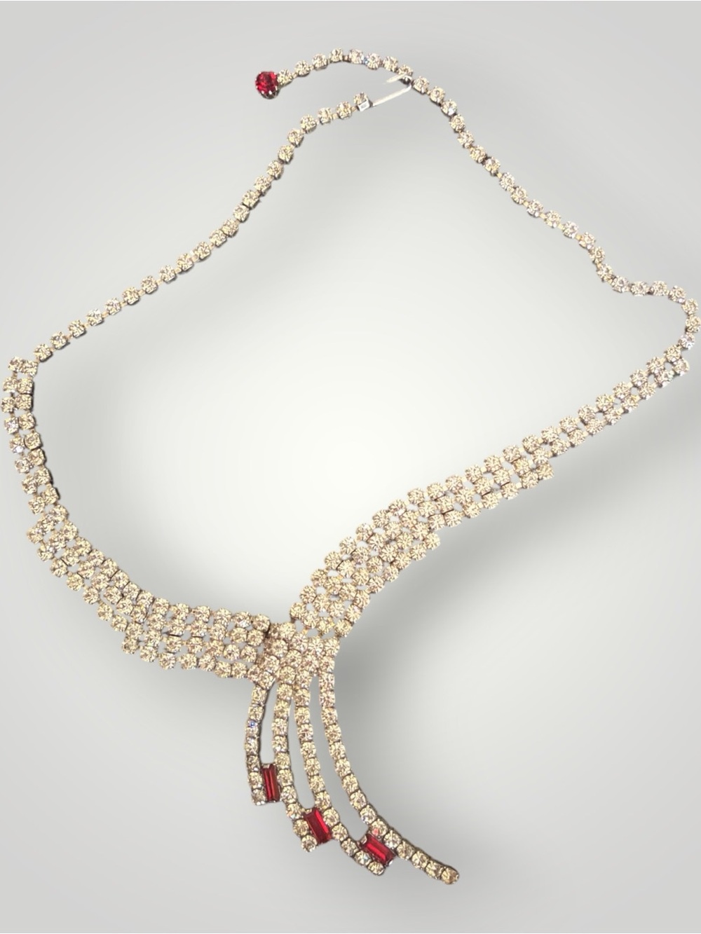 Elegant Crystal Fringe Necklace with Red Accent